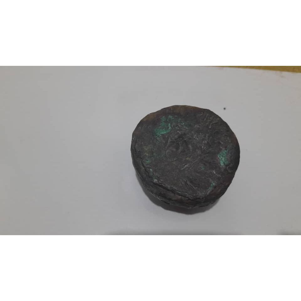 شی شبیه مهر قدیمی