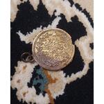 اصل یا تقلبی بودن سکه آویزی