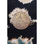 اصل یا تقلبی بودن سکه آویزی